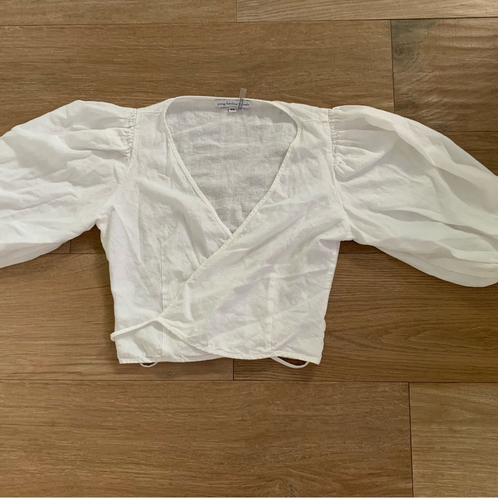 Bought at Mora Sustainable store. White long sleeve blouse cropped with puffs